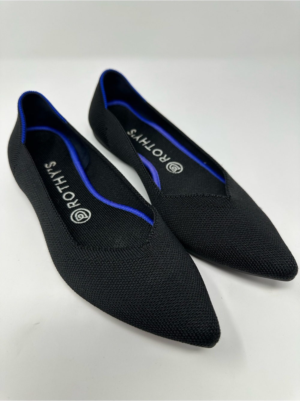 Rothy's Black Pointed Knit Ballet Flat with Blue Trim